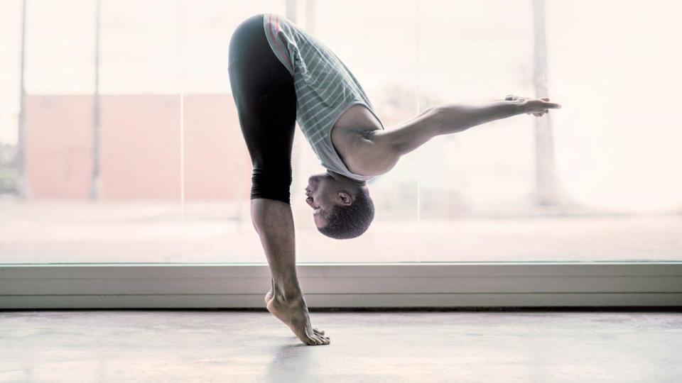 Man performing yoga.